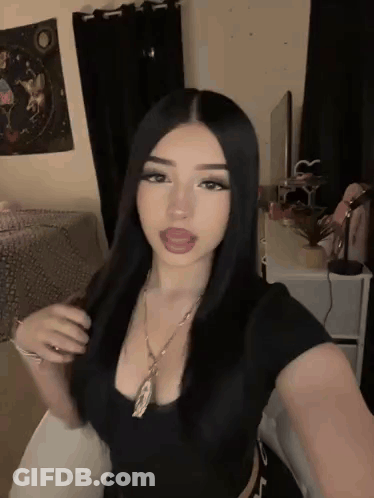 Woman Taking Selfie With Tongue Out GIF