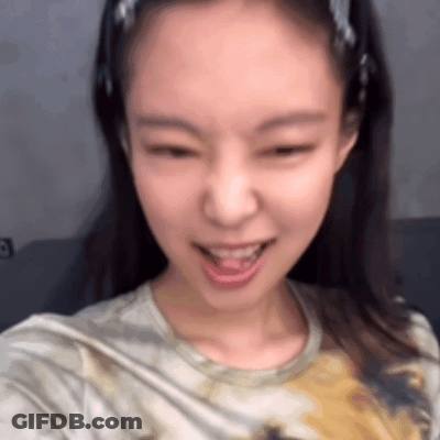 Woman Taking Selfie With Tongue Out GIF