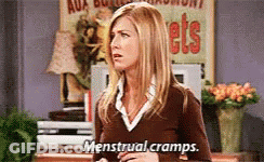 Woman Talking About Menstrual Cramps GIF