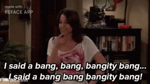 Woman Talking By Bookshelf In Living Room GIF