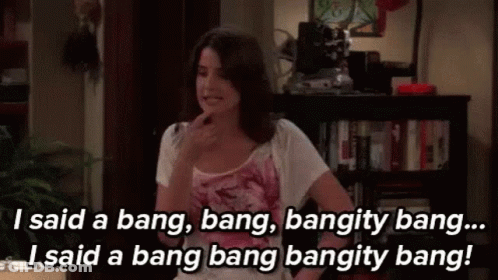 Woman Talking In Living Room With Bookshelf GIF