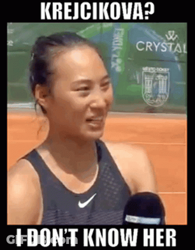 Woman Talking Into Microphone On Tennis Court GIF