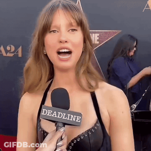 Woman Talking Into Microphone Saying Deadline GIF