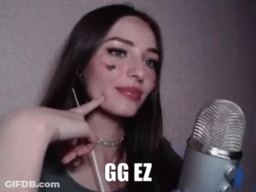 Woman Talking Into Microphone With GG EZ On Face GIF