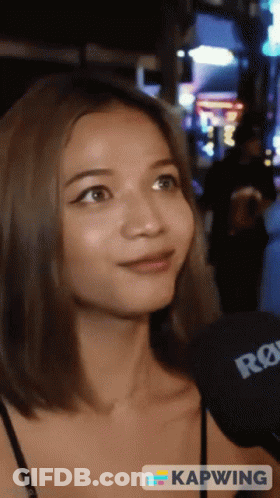Woman Talking Into Rode Microphone Saying Kapwing GIF