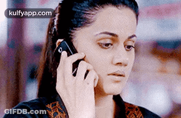 Woman Talking On Cell Phone GIF