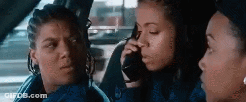Woman Talking On Cell Phone In Back Seat Of Car GIF