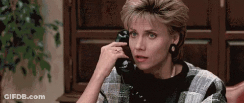 Woman Talking On Cell Phone GIF