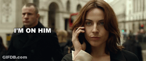 Woman Talking On Cell Phone GIF