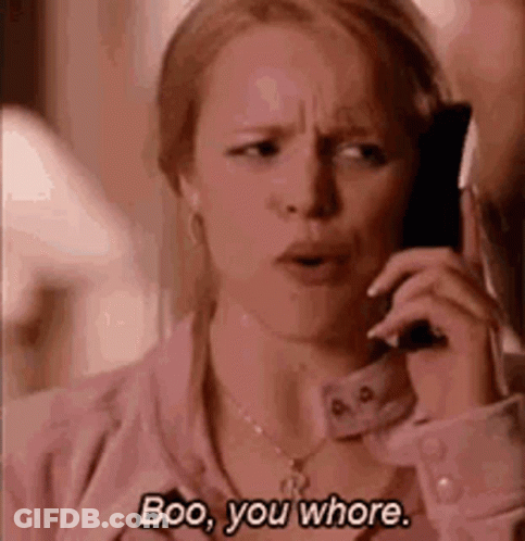 Woman Talking On Cell Phone Saying Boo You Whore GIF