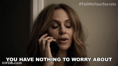 Woman Talking On Cell Phone Saying Nothing To Worry About GIF