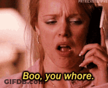 Woman Talking On Cell Phone Says Boo You Whore GIF