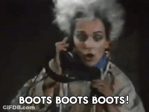 Woman Talking On Phone Boots Boots Boots GIF