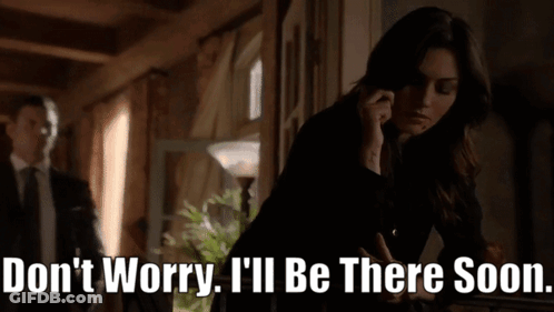 Woman Talking On Phone Don't Worry I'll Be There Soon GIF