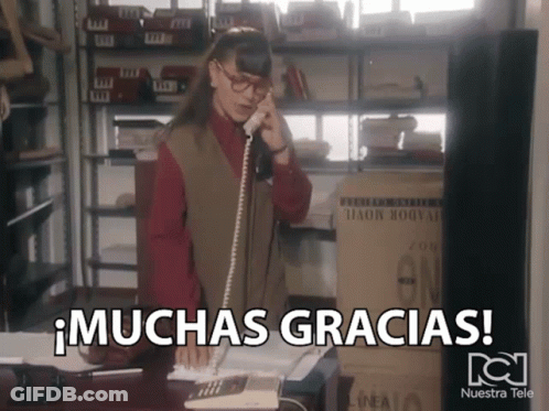 Woman Talking On Phone Muchas Gracias GIF