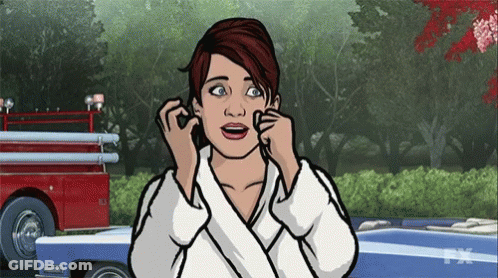 Woman Talking On Phone With Fire Truck In Background GIF