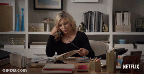 Woman Talking On Phone With Netflix Logo GIF