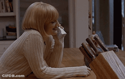 Woman Talking On Phone GIF