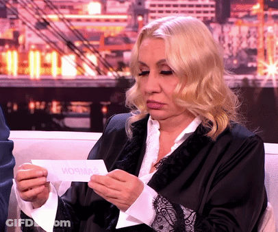 Woman Talking On TV With Foreign Caption GIF