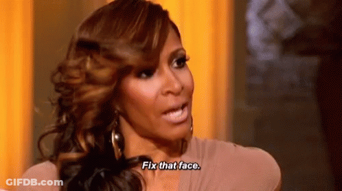 Woman Talking To Another Saying Fix That Face GIF