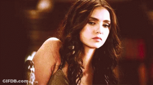 Woman Talking To Man In Dark Room Holding Hands Together GIF