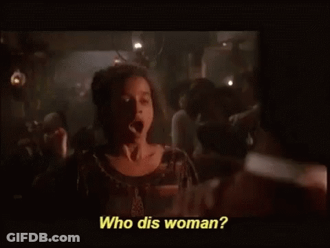 Woman Talking To Man In Dark Room Saying Who Dis Woman GIF