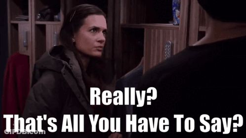 Woman Talking To Man In Locker Room GIF