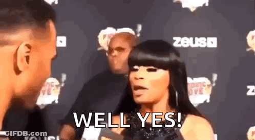 Woman Talking To Man On Red Carpet Says Well Yes GIF