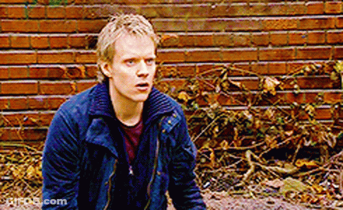 Woman Talking To Man Saying I Will Protect Them Both GIF