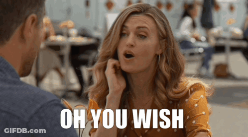 Woman Talking To Man Saying Oh You Wish GIF