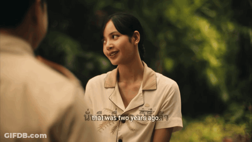 Woman Talking To Man Saying That Was Two Years Ago GIF