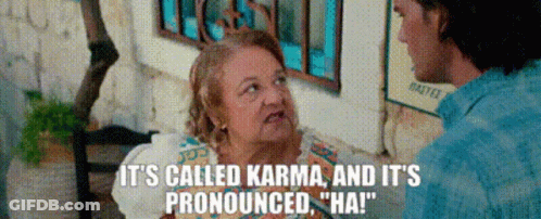 Woman Telling Man It's Called Karma Pronounced Ha GIF