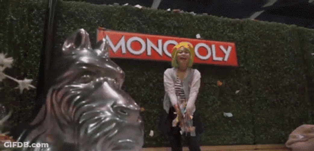 Woman Throwing Monopoly Money Into Air GIF