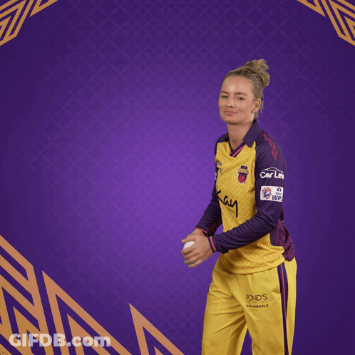 Woman Throws Ball In Yellow Purple Chennai Super Kings Jersey GIF