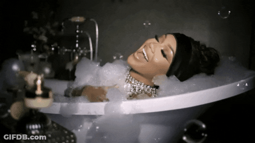 Woman Throws Bubbles From Bubble Bath GIF