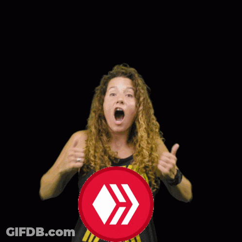 Woman Thumbs Up In Front Of Awesome Neon Sign GIF