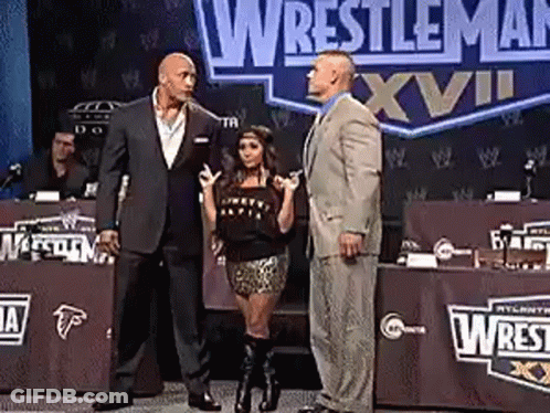 Woman Thumbs Up In Front Of Wrestle University Sign GIF