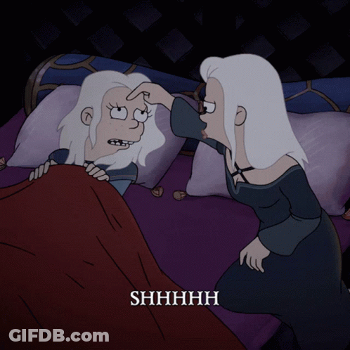 Woman Touching Another's Forehead Saying Shhhh GIF