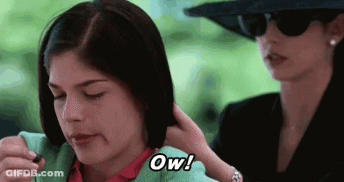 Woman Touching Another Woman's Hair Saying Ow GIF