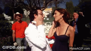 Woman Touching Man's Face GIF