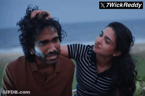 Woman Touching Man's Head With 7Wickreddy Logo GIF