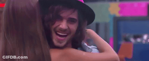 Woman Touching Man's Nose Smiling GIF