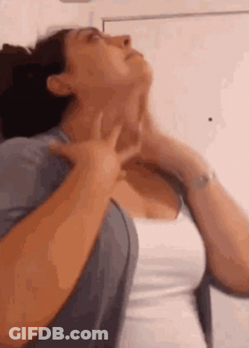 Woman Touching Neck Looking Up GIF
