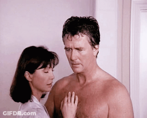 Woman Touching Shirtless Man's Chest GIF