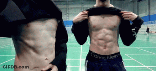 Woman Touching Shirtless Man's Stomach GIF