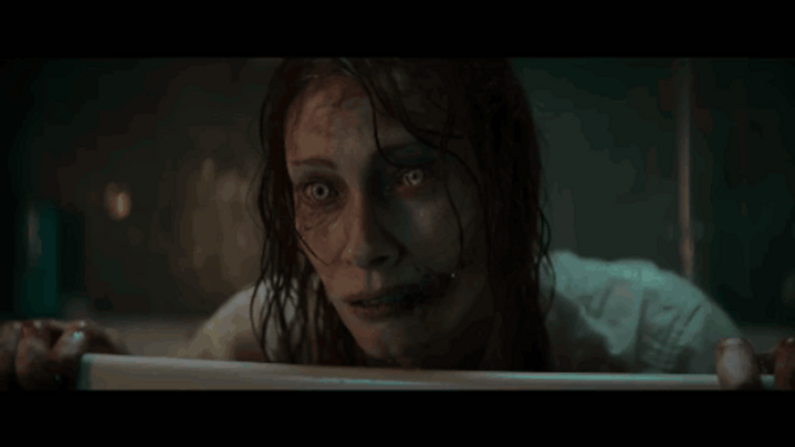 Woman Turns To Evil Dead GIF