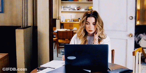 Woman Using Laptop With Microsoft Sticker GIF