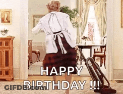 Woman Using Vacuum Cleaner In Living Room GIF