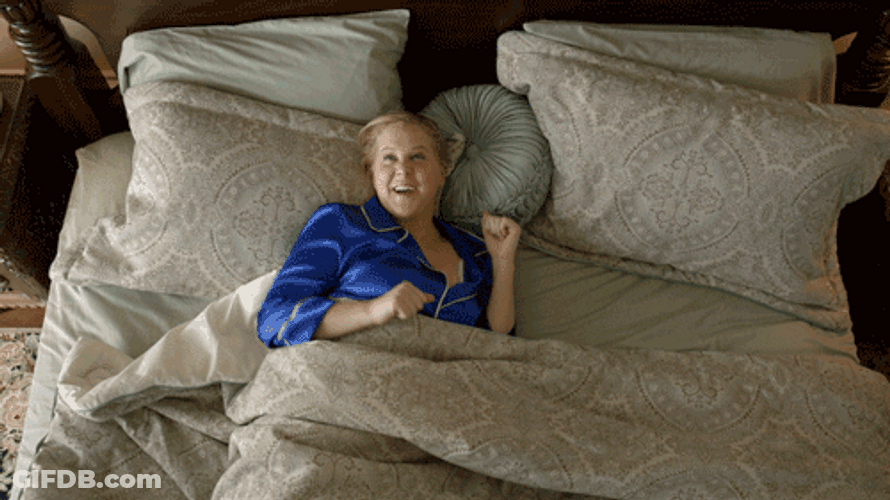 Woman Waking Up Happily GIF