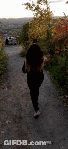 Woman Walking City View Path GIF